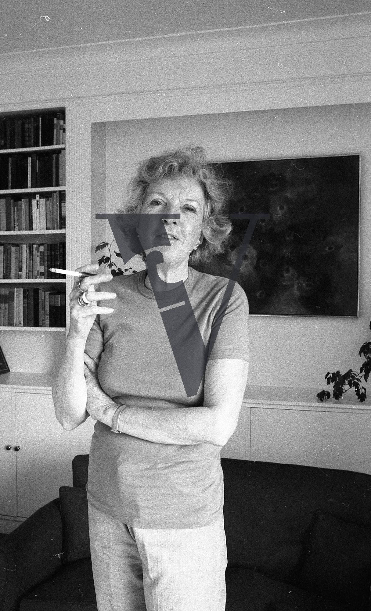 Martha Gellhorn, portrait, smoking cigarette.
