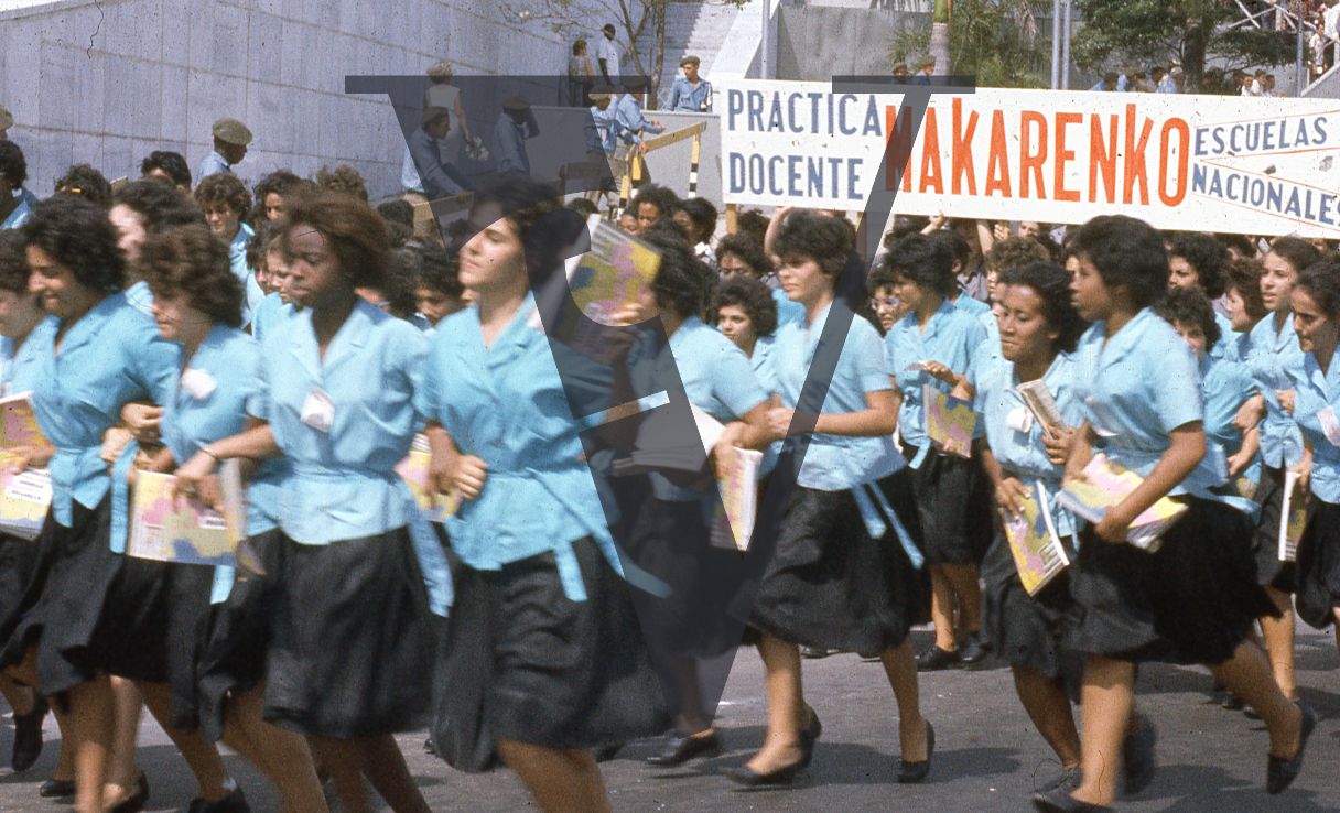 Cuba, Havana, May 1st Parade, girls in blue march, Makarenko.