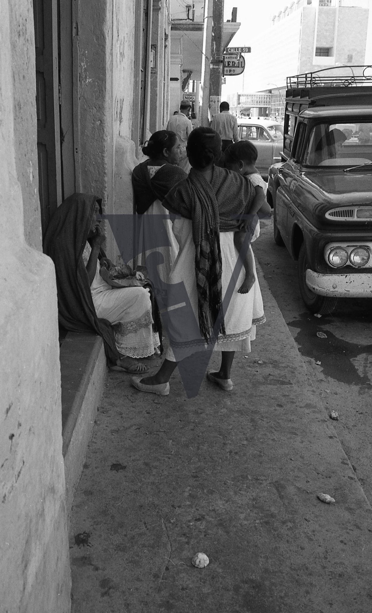 Mexico, Street scene, women talking.