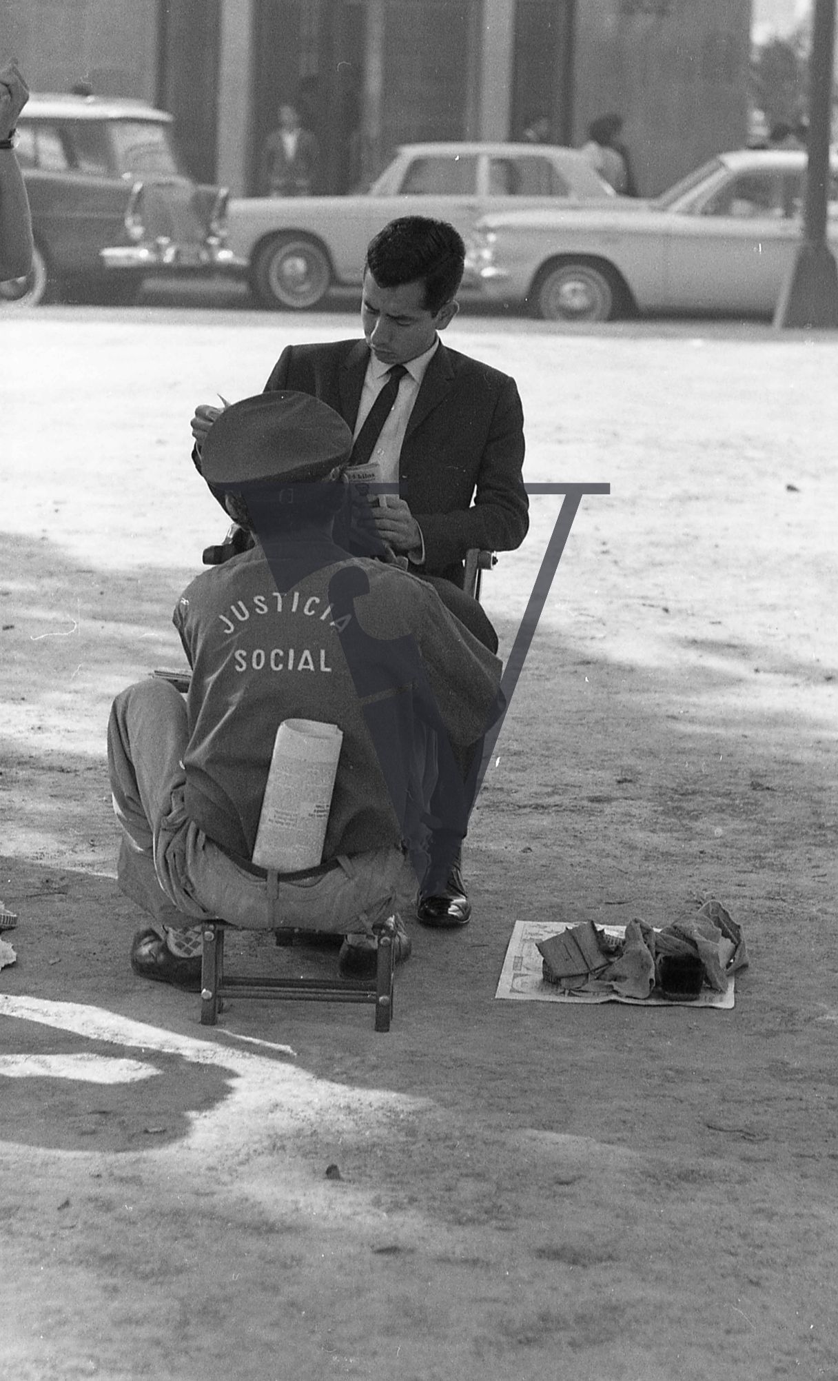 Mexico, Man having shoes polished.