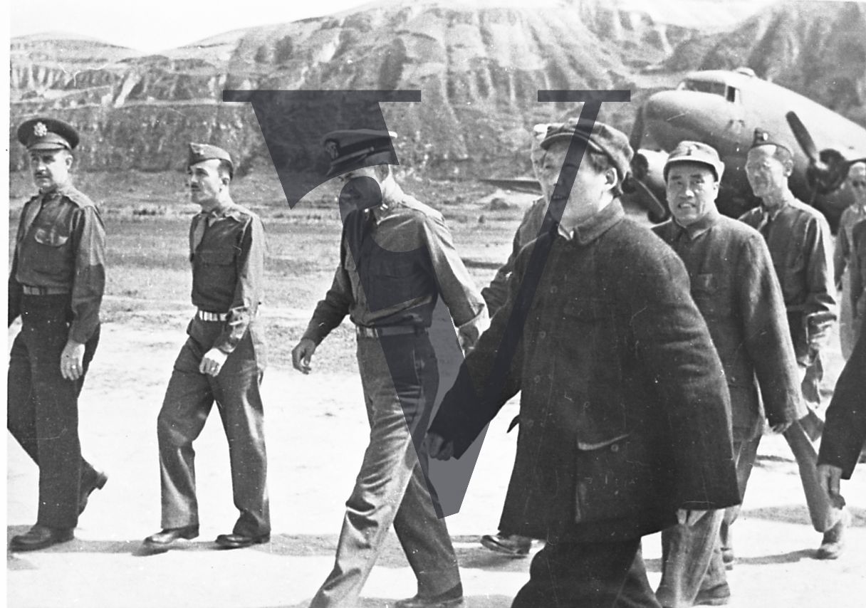 China, Yenan, US servicemen, Mao Zedong, Zhu De, plane, airstrip, landscape.