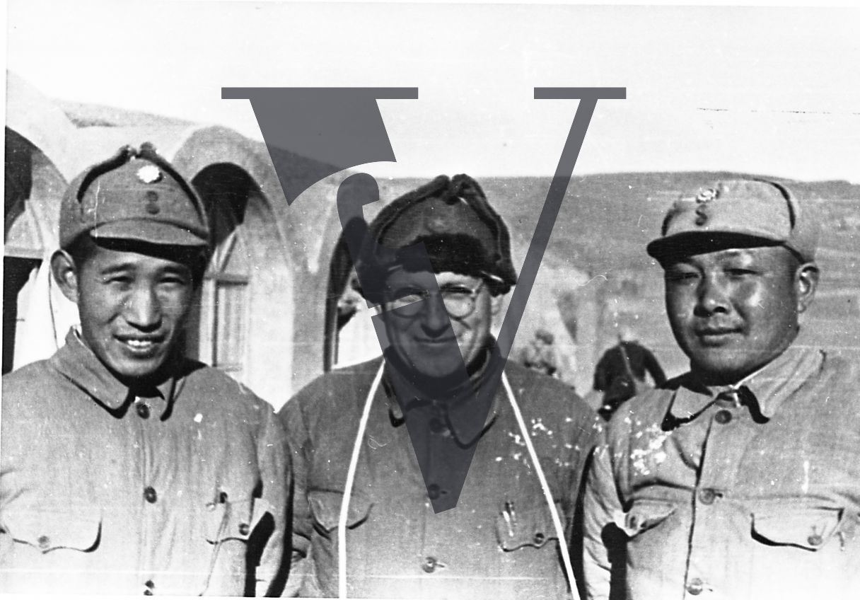 China, Yenan, Chinese serviceman, Wilbur J. Peterkin, General Chao, portrait, smiling, landscape.
