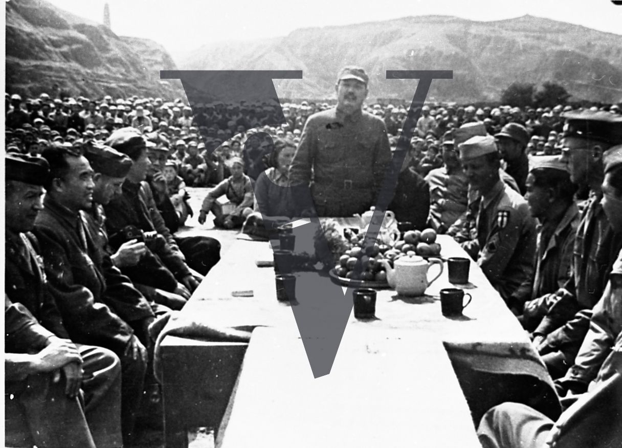 China, Yenan, General Ye Jianying, US and Chinese servicemen, banquet table, landscape, wide shot.