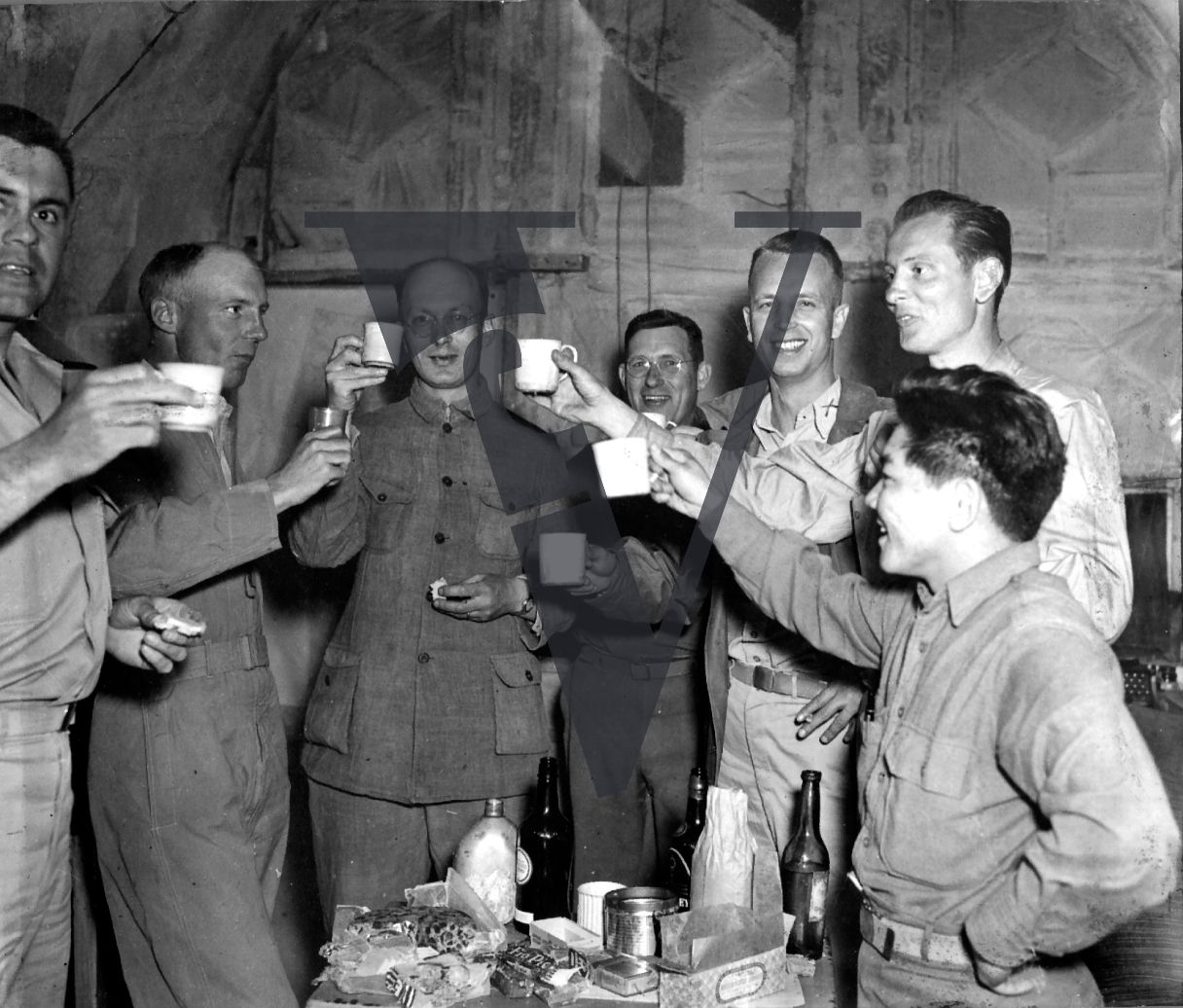China, Yenan, US officials making a toast, portrait.