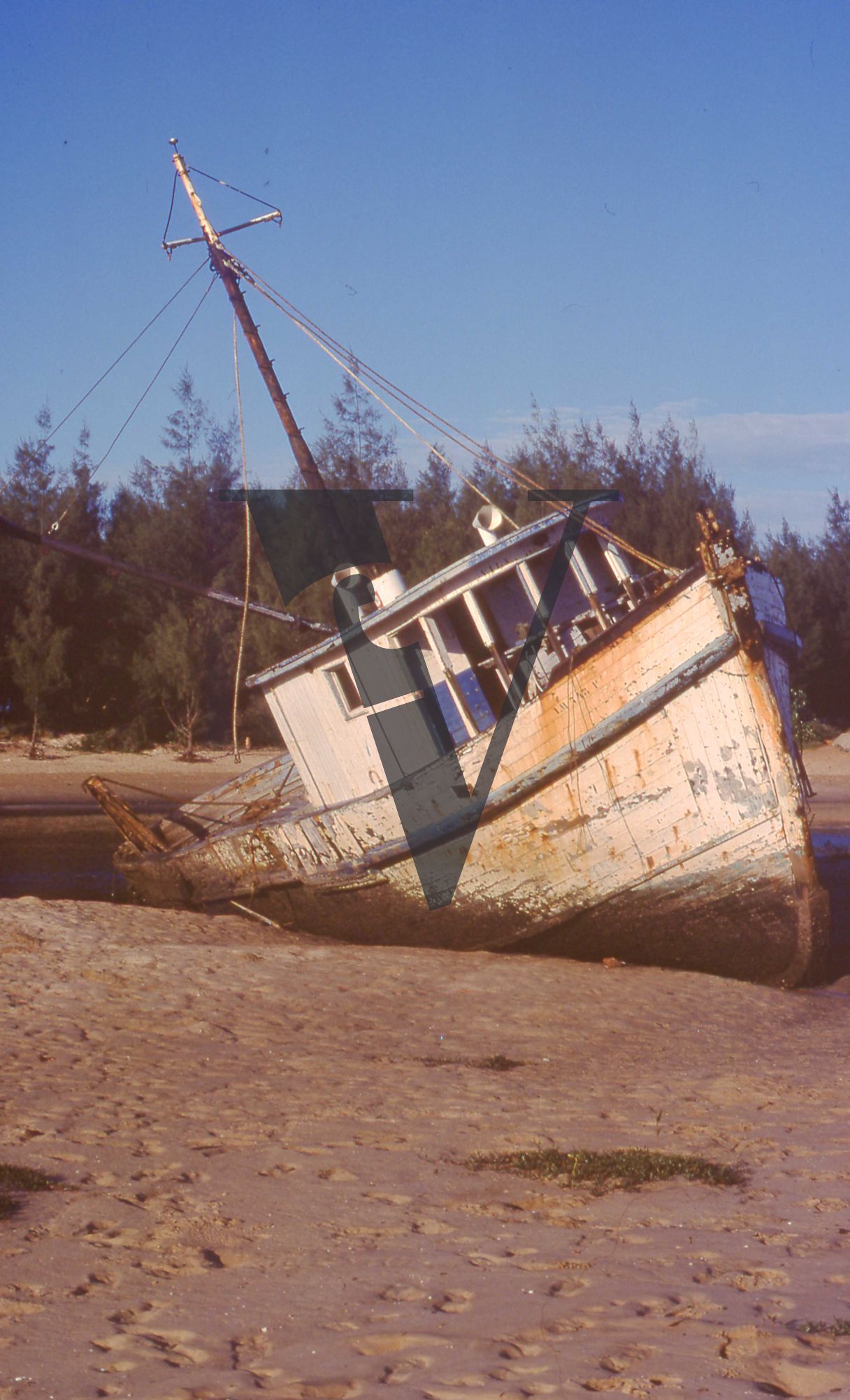 Mozambique, Southern Africa, boat in dry river, portrait.