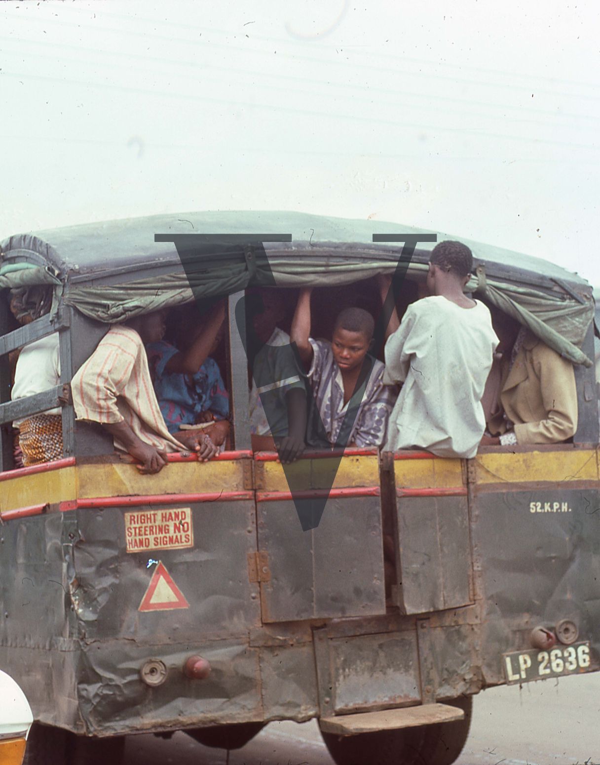 Nigeria, boys in the back of a truck.