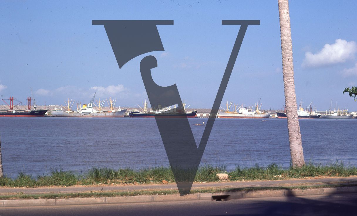Nigeria, wide-shot of Lagos docks, large tankers.