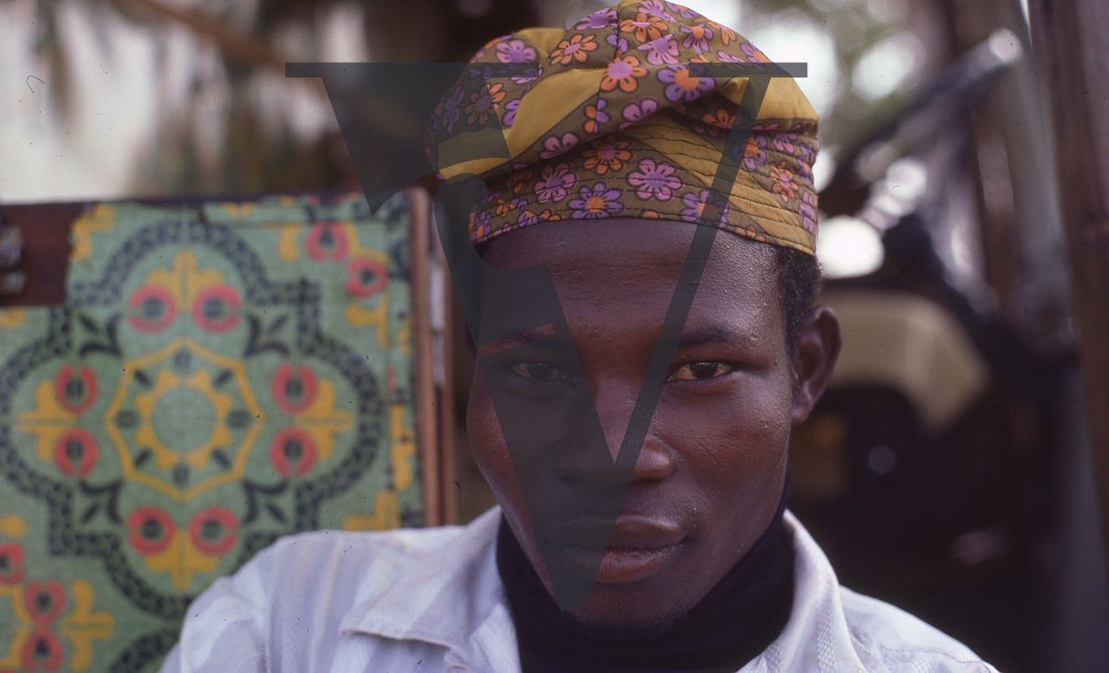 Nigeria, man with hat, portrait.