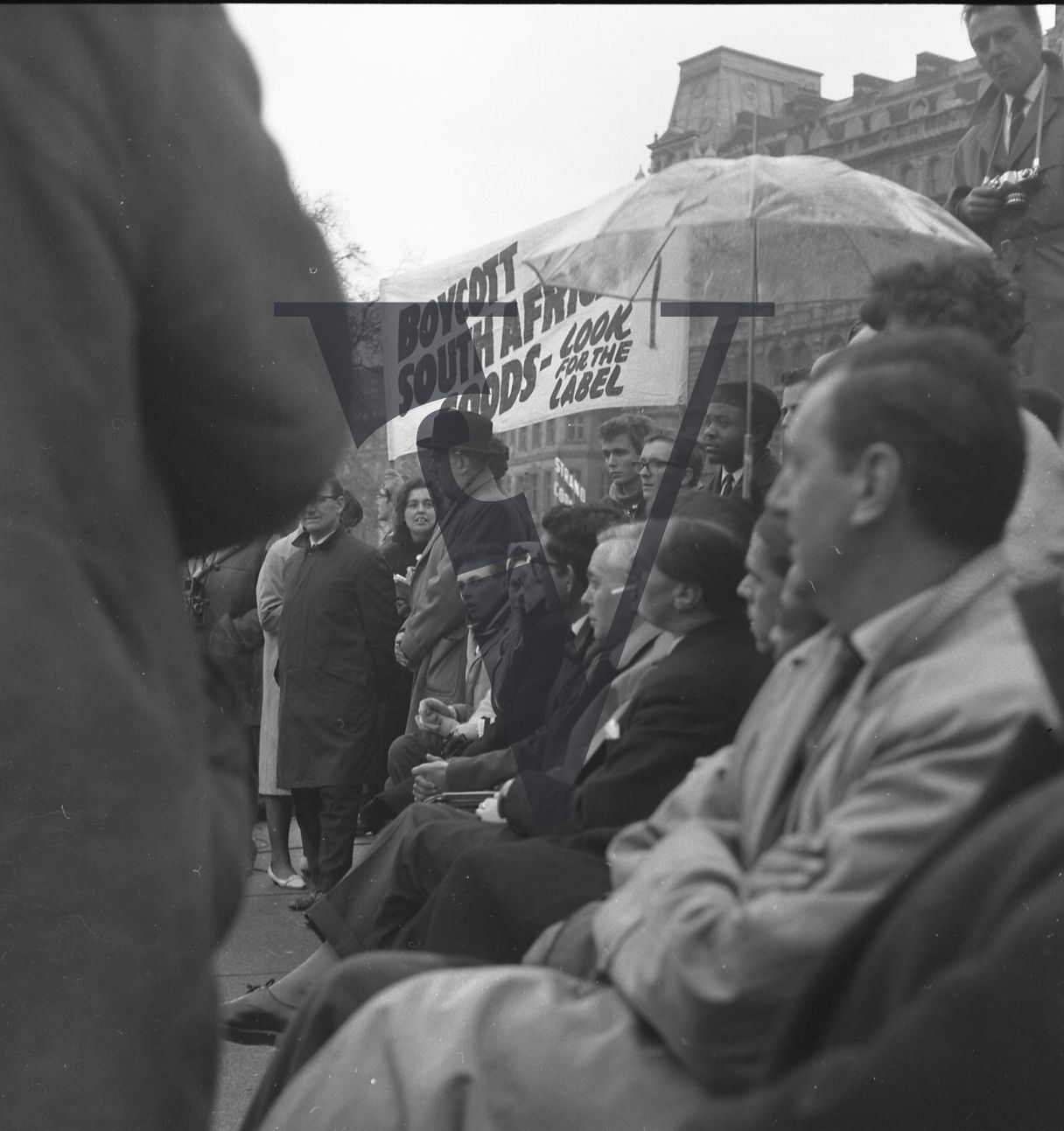 Anti-Apartheid Demo, Trafalgar Square, Harold WIlson sits with colleagues.