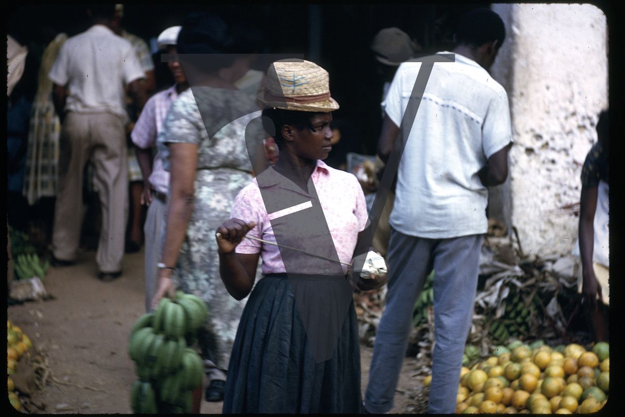 Belize, Punta Gorda, Woman in marketplace.