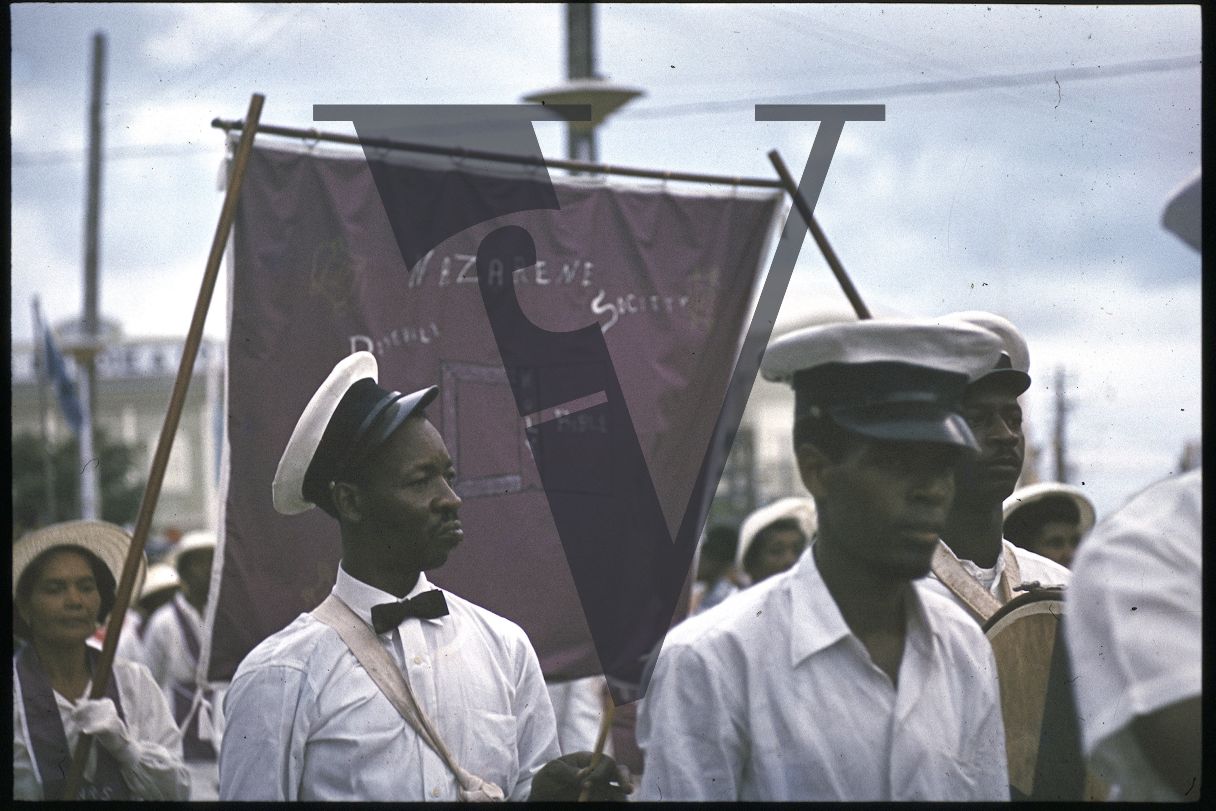 Belize, Procession, banners Nazarene Society.