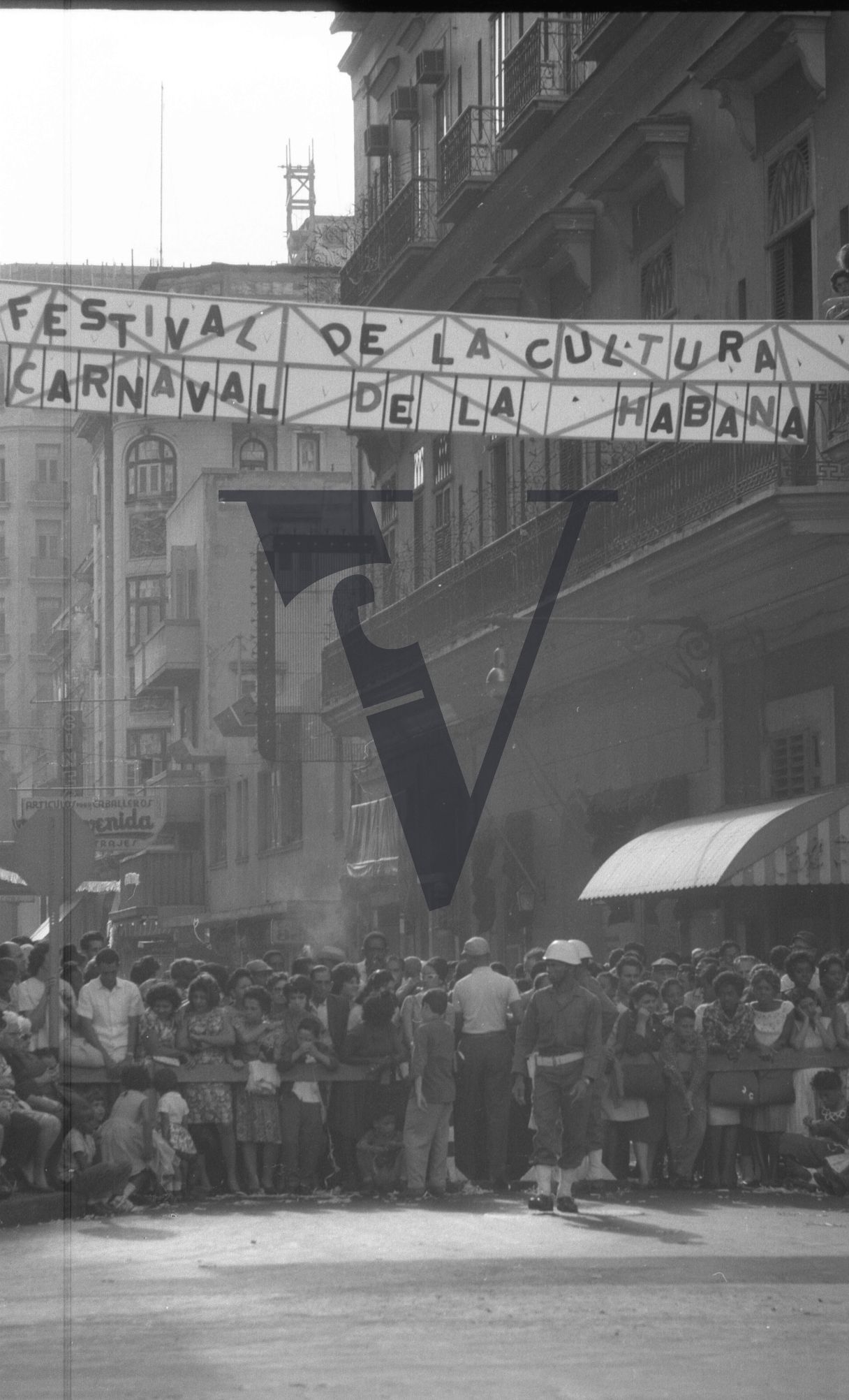 Cuba, Havana Carnival, banner spread across buildings.