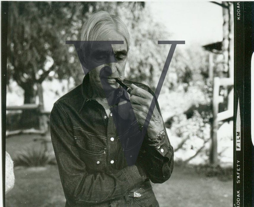 Bill Hawk, Taos, New Mexico, portrait, denim, pipe smoking.
