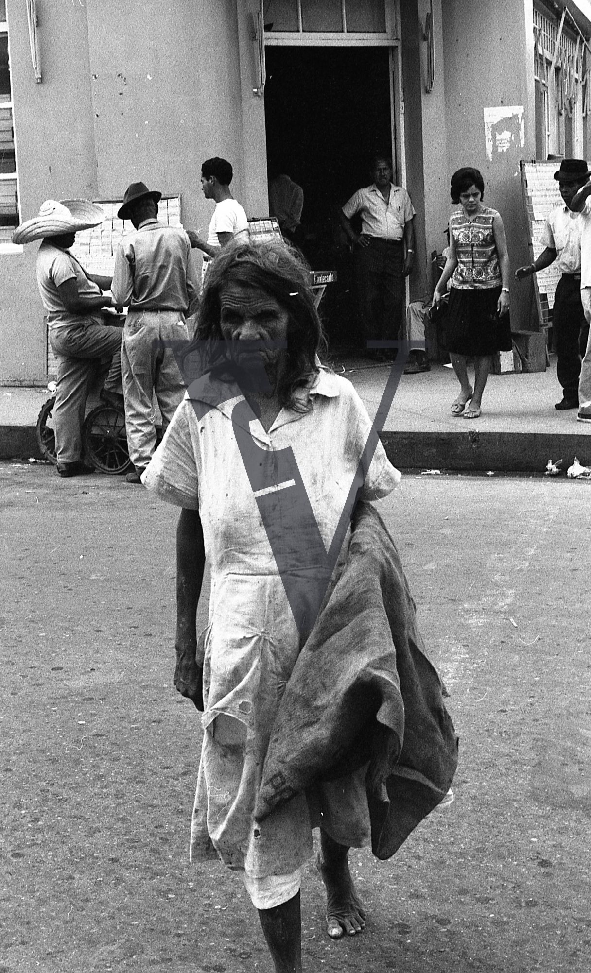 Dominican Republic, elderly woman, street scene.