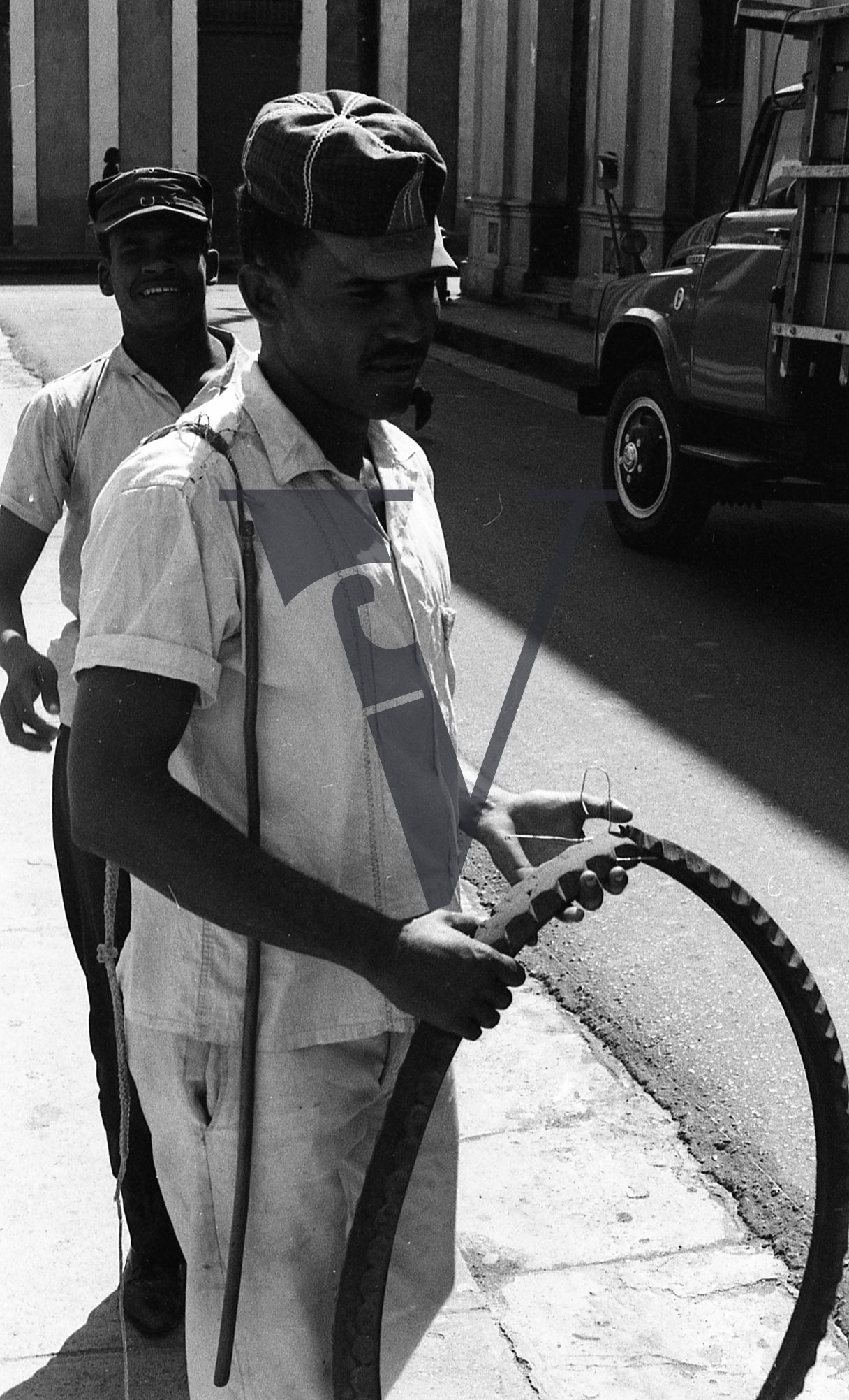 Dominican Republic, man, bicycle tyre.