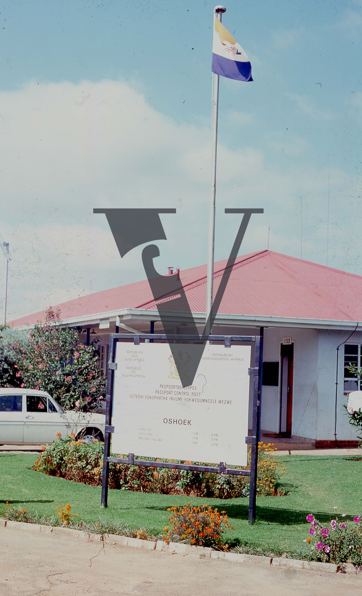 Eswatini, (formerly Swaziland), Oshoek Passport Control Post, flag.