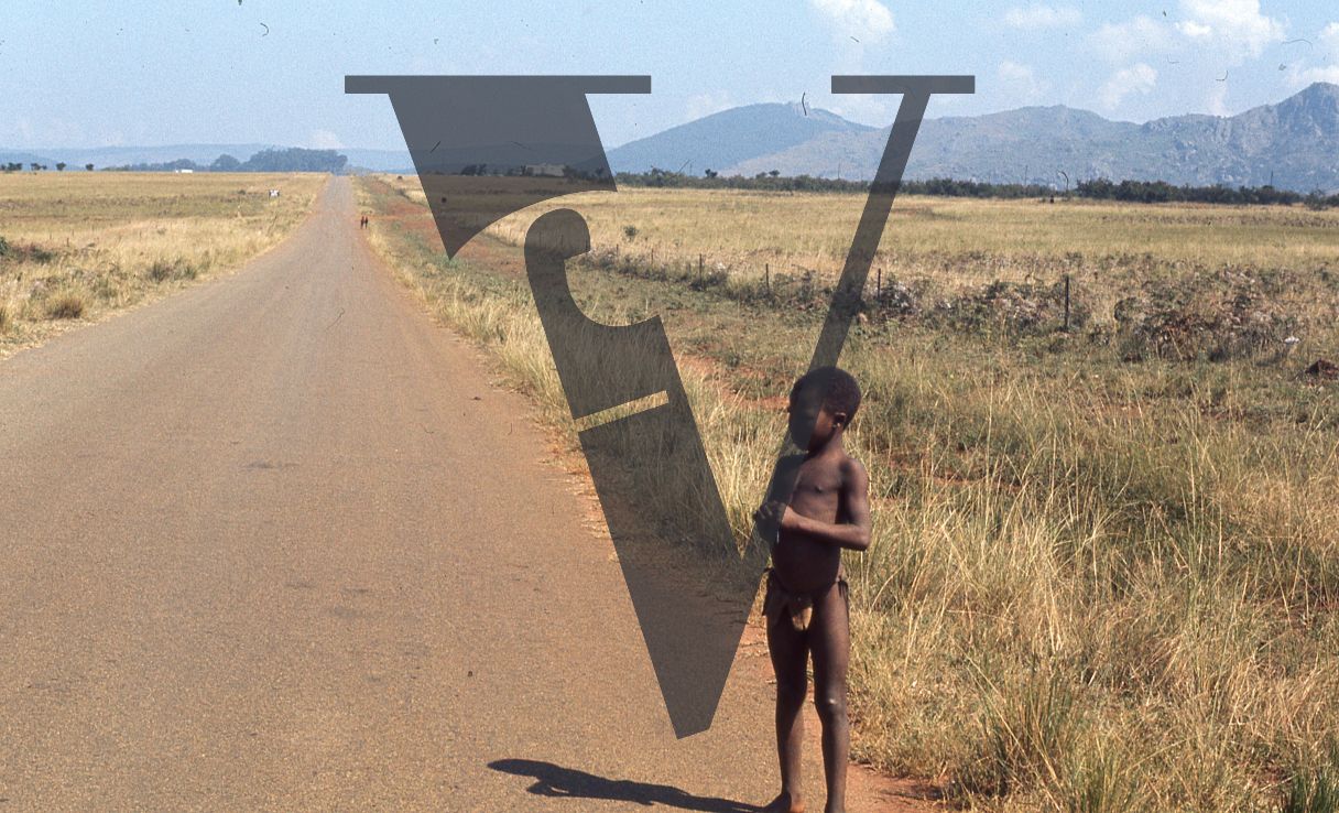 Eswatini, (formerly Swaziland), small child on road.