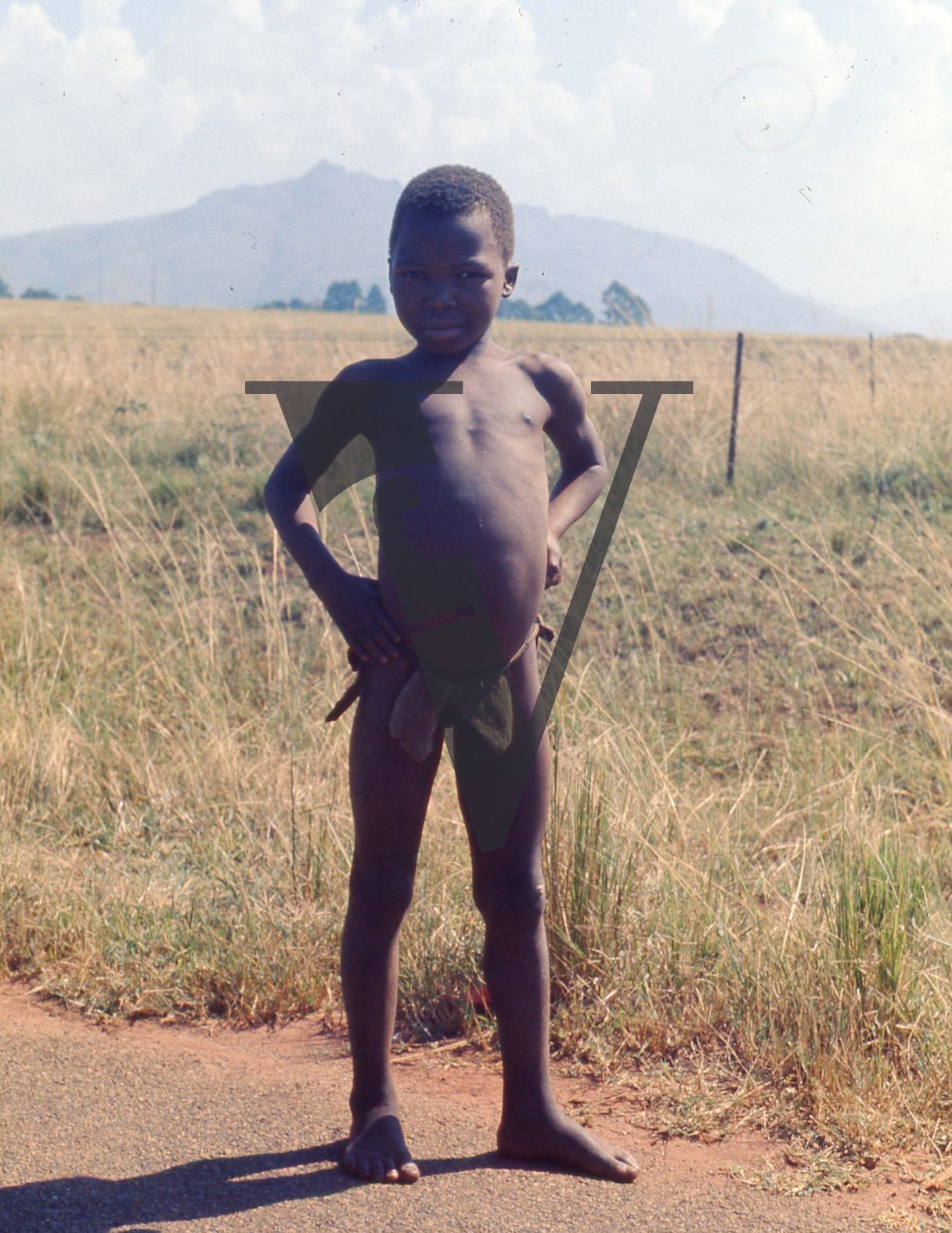 Eswatini, (formerly Swaziland), small child on road, portrait.