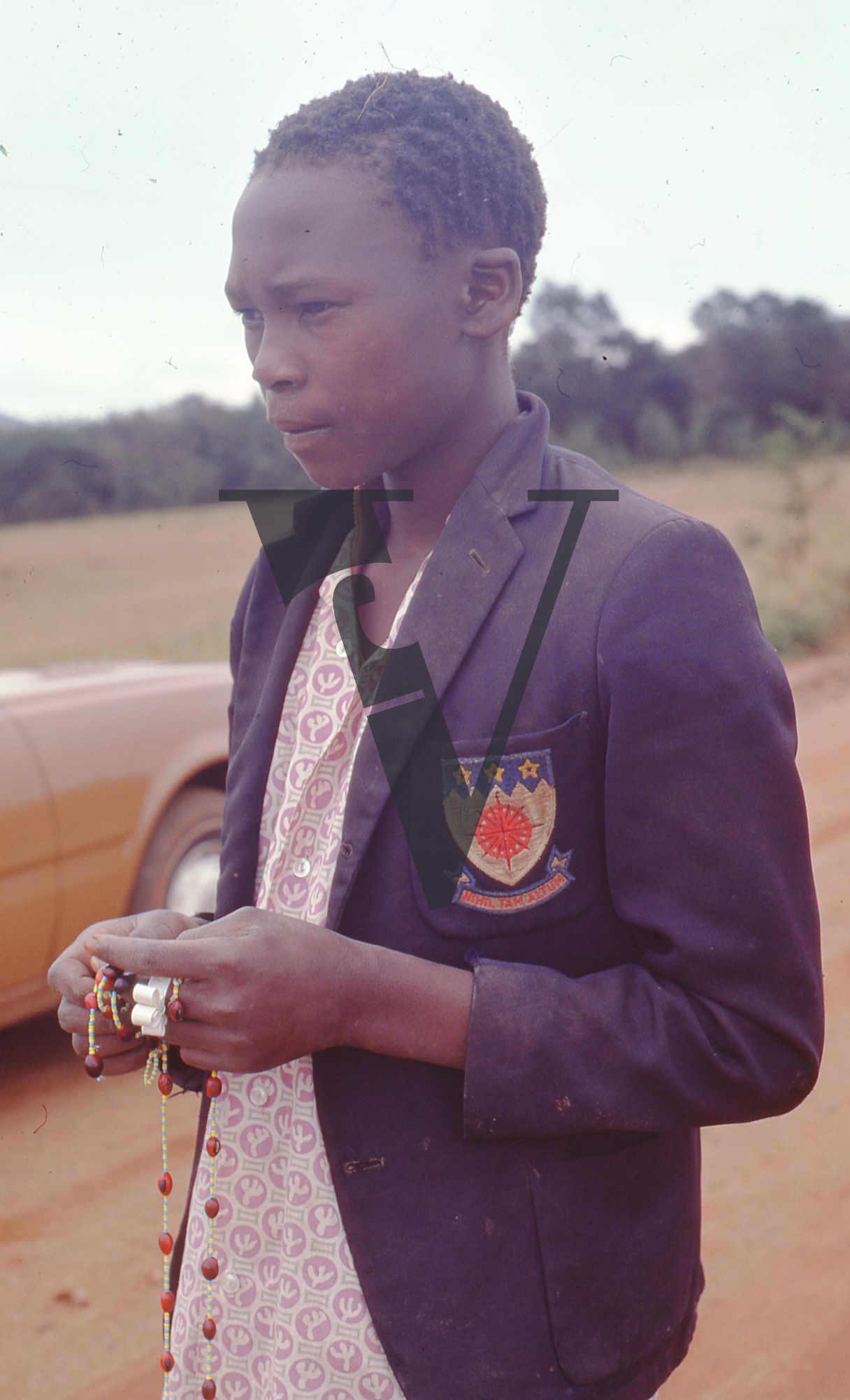 Eswatini, (formerly Swaziland), portrait, boy in school blazer.