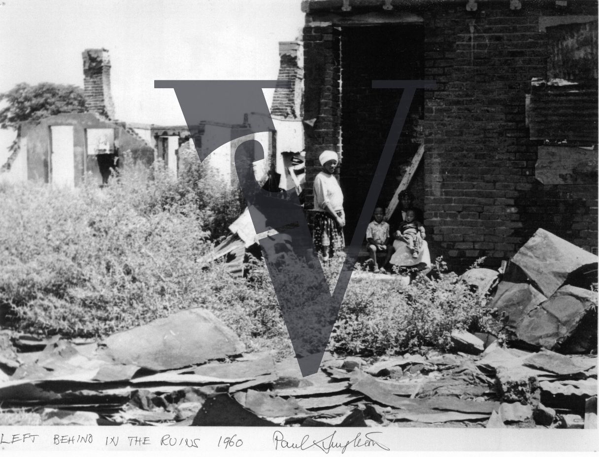 Sophiatown, family, 'left behind in the ruins', portrait, poverty, rubble.
