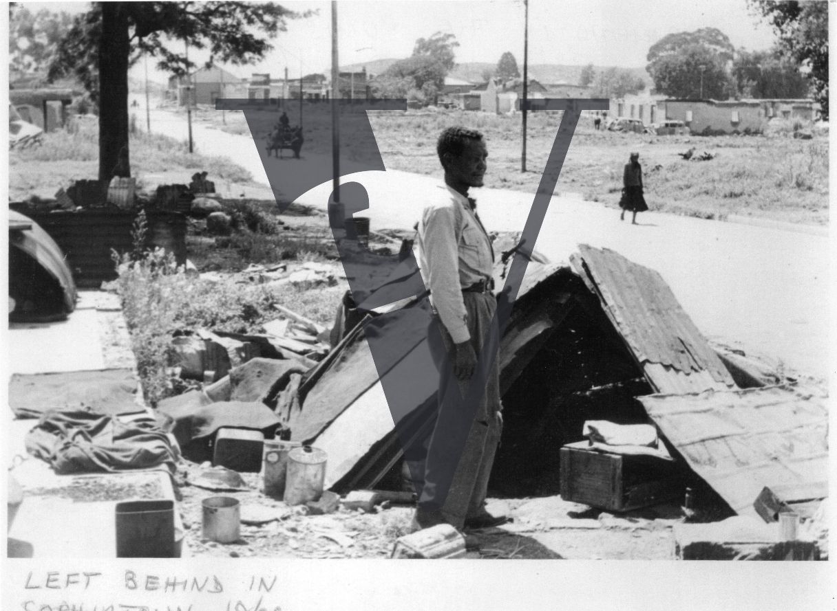 Sophiatown, man stands by rubble and ruins, streetview.