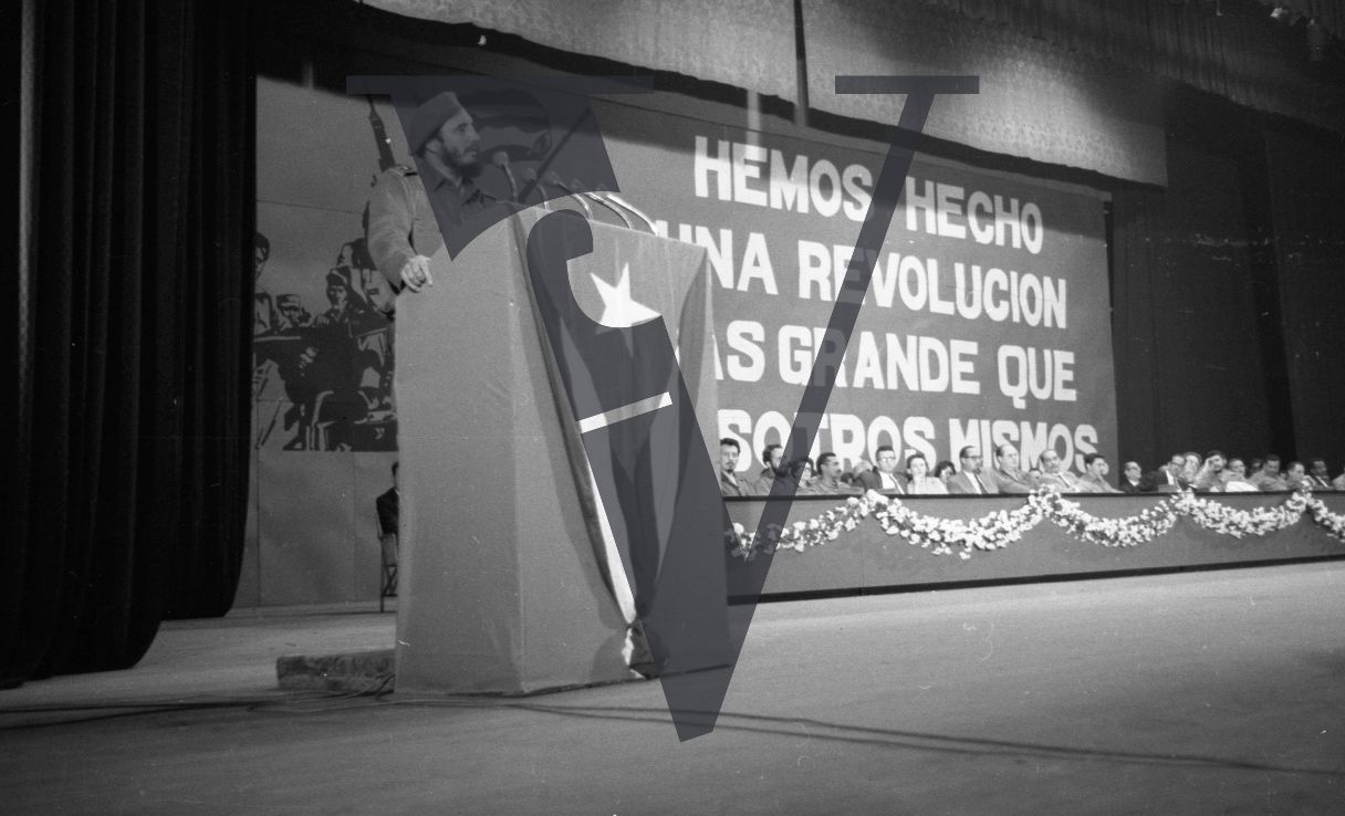 Cuba, Fidel Castro conference speech, standing at plinth.
