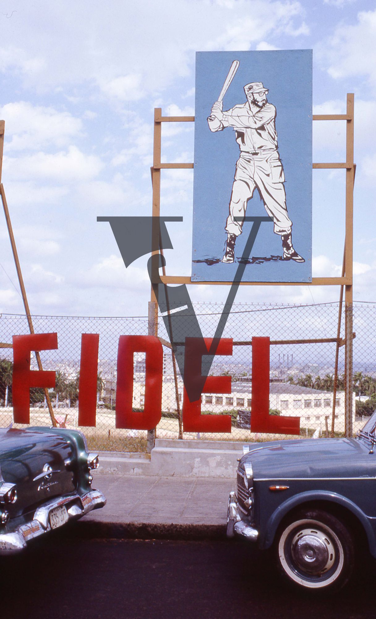 Cuba, Fidel Castro sports billboards, Castro playing baseball.