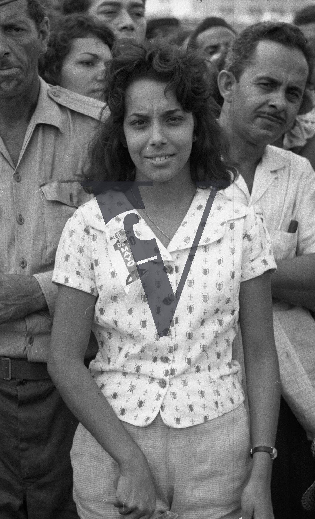 Cuba, Havana, May 1st, woman onlooker, portrait.