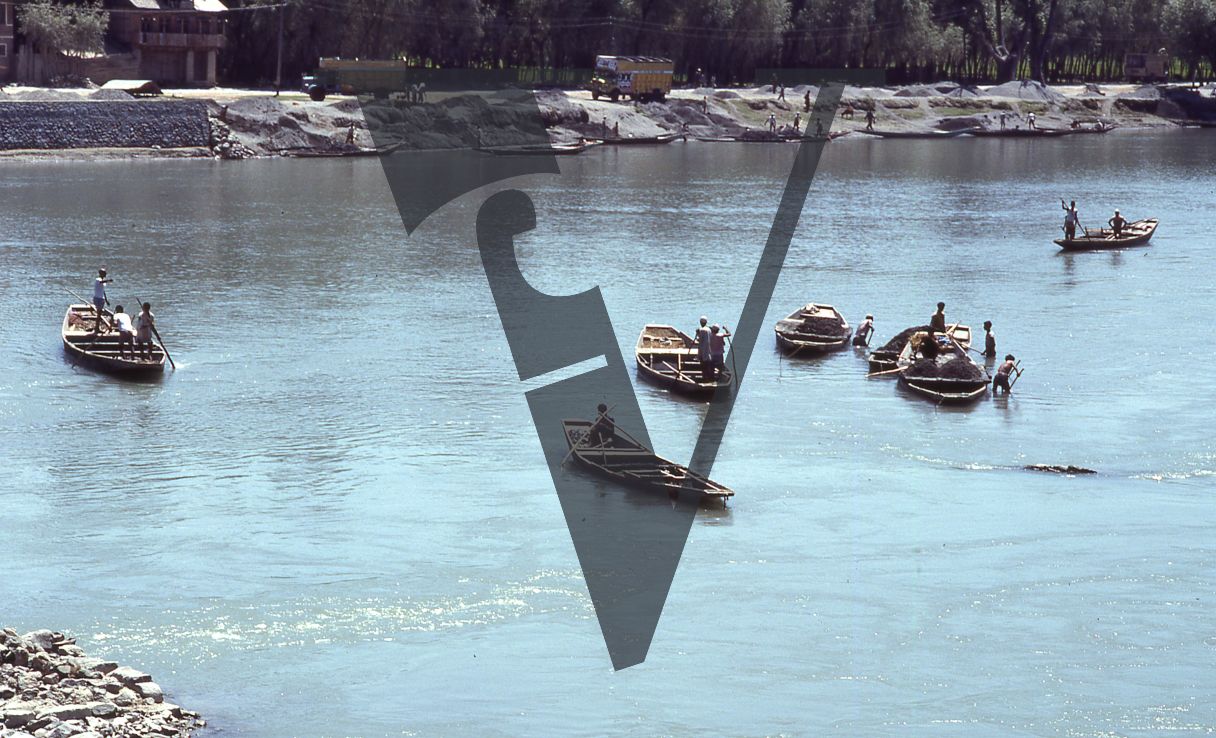 Kashmir, Small boats on Dal lake.