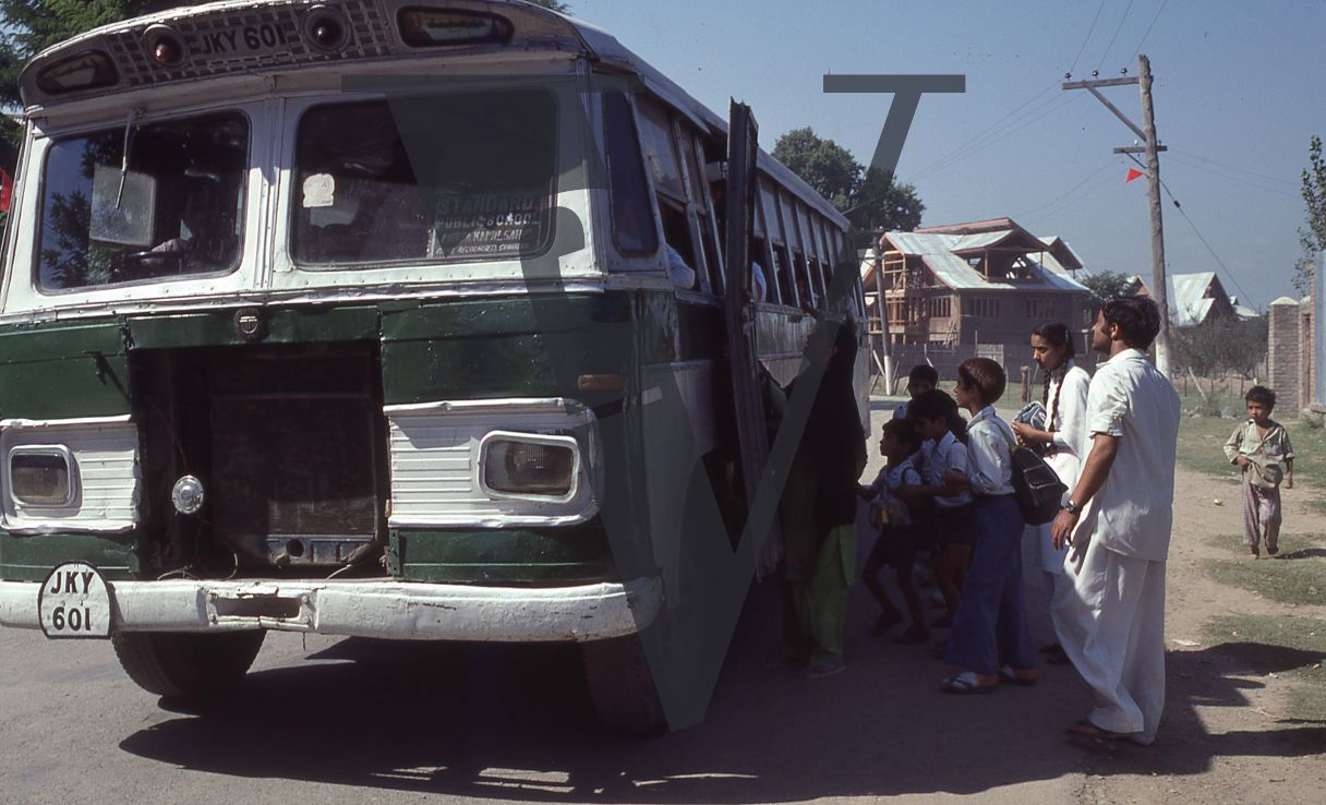 Kashmir, Schoolbus picking passengers.