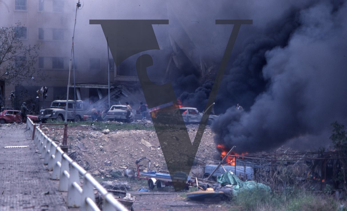 Lebanon, US Embassy Bombing, April 18, Beirut, wide-shot, black smoke, frantic.