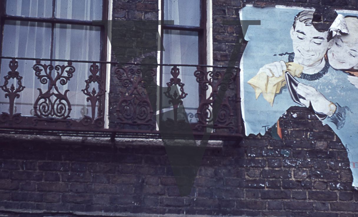 London, Sixties, poster and balcony.