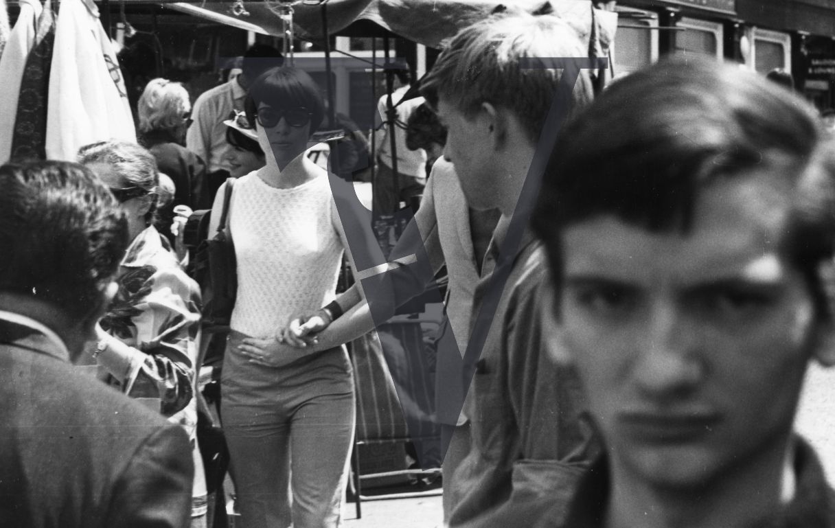 London, Sixties, woman in shades, Portobello Road market.