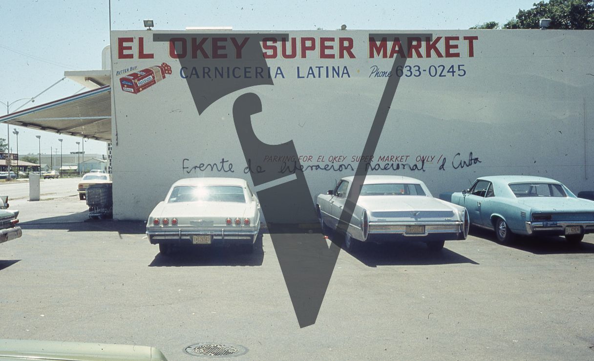 The Paperback Vigilante, Miami street scenes, El Okey Market, carpark.