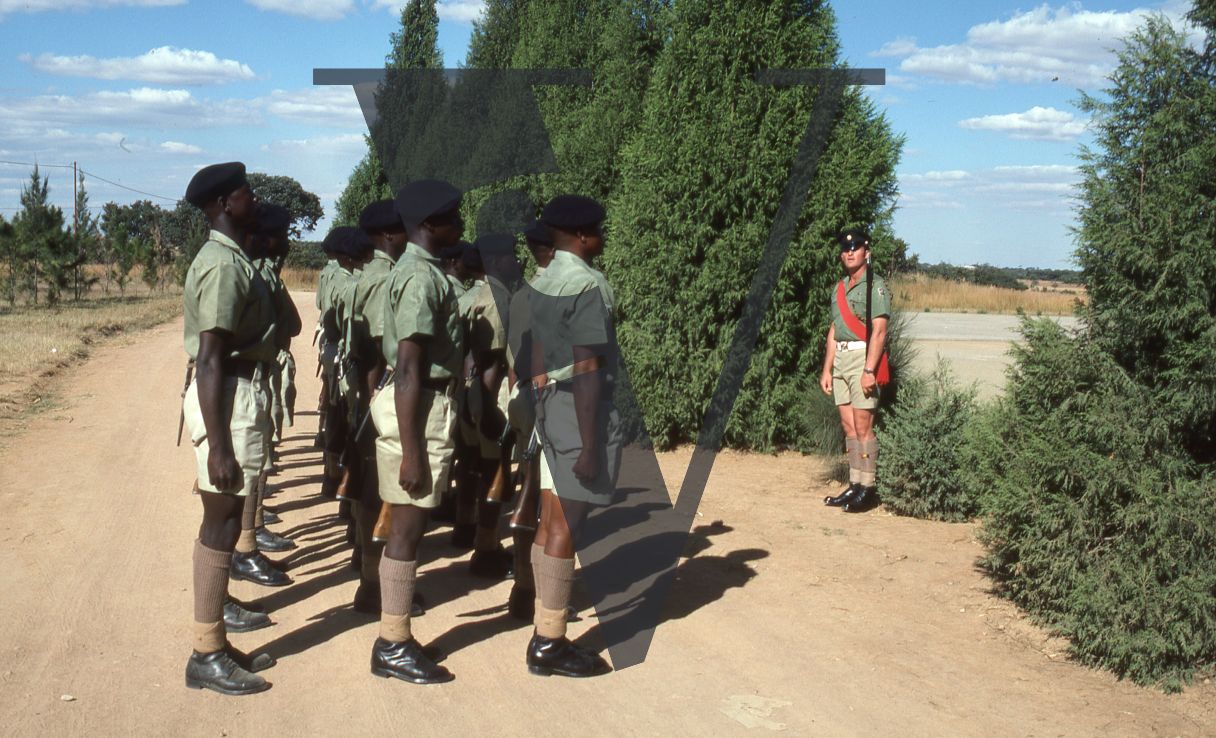 Rhodesia, Rhodesian African Rifles, standing to attention, full shot.