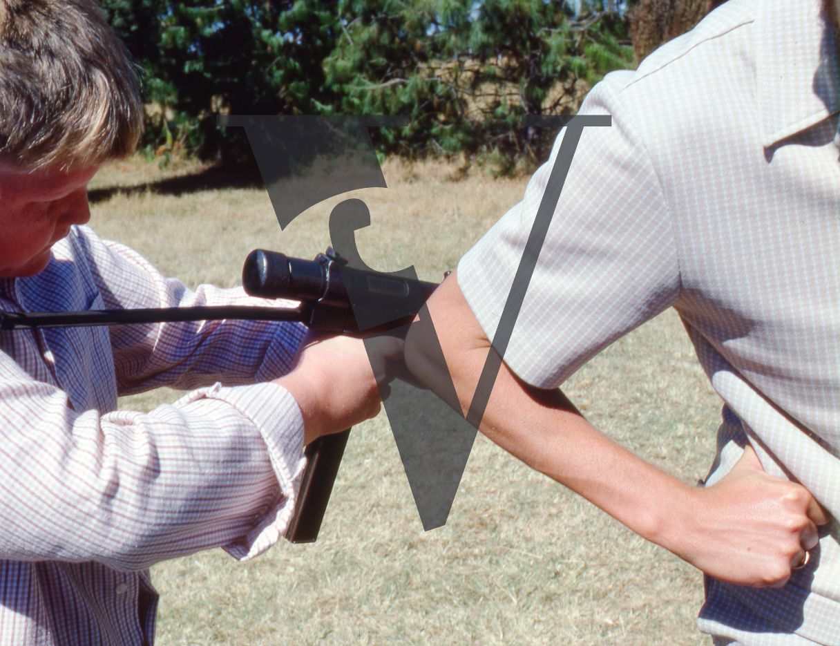 Rhodesia, young boy with modified WW2 Sten gun.