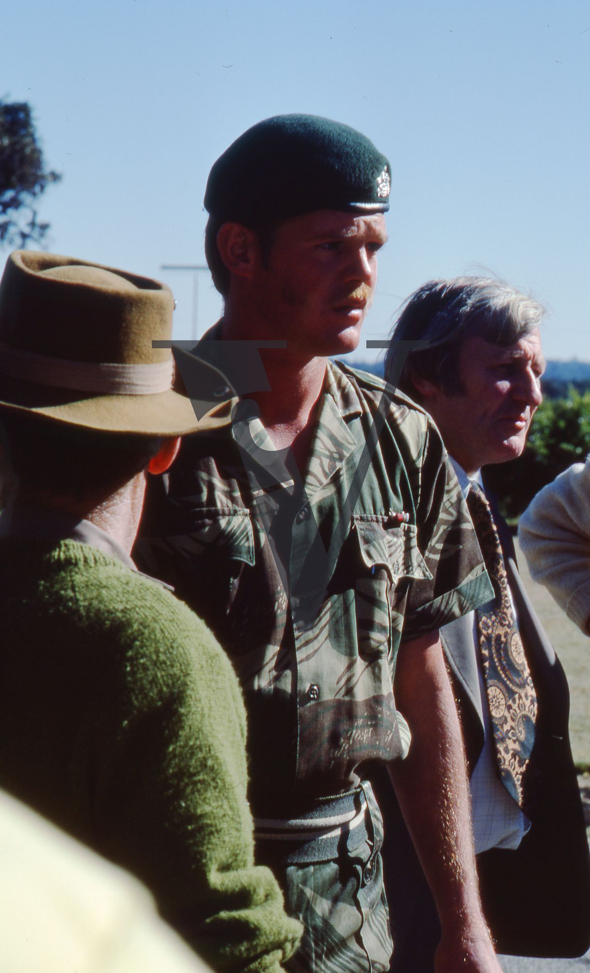 Rhodesia, Rhodesian Light Infantry, passing out ceremony, soldier in crowd, mid-shot.
