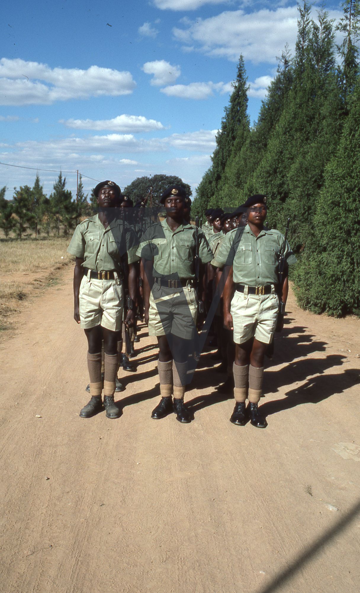 Rhodesia, Rhodesian Light Infantry, soldiers standing at attention, military training area, full shot.