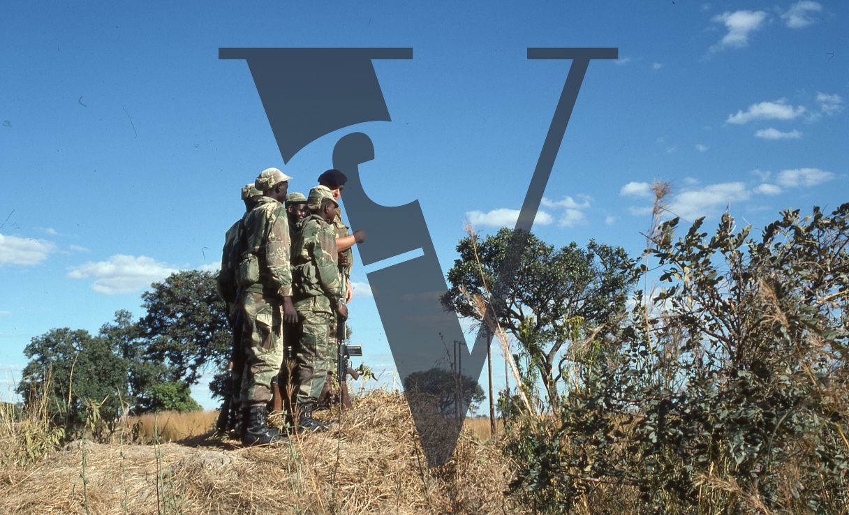 Rhodesia, Rhodesian Light Infantry, soldiers, landscape, full shot.