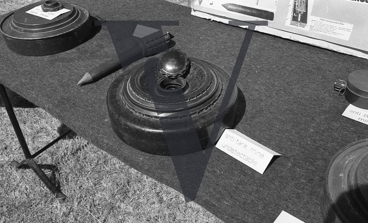 Rhodesia, Rhodesian Light Infantry passing out ceremony, anti-tank mine anti-personnel mines on display.
