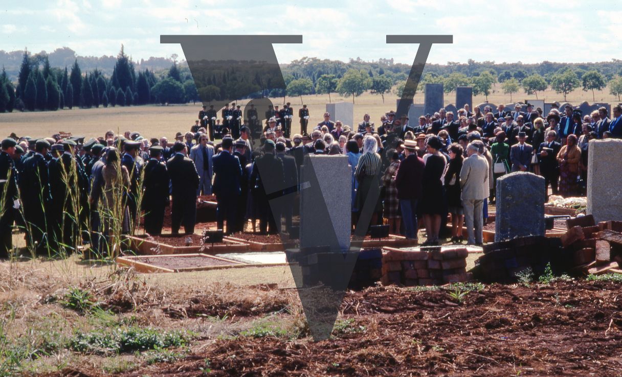 Rhodesia, Jewish funeral, mourners, wide shot.