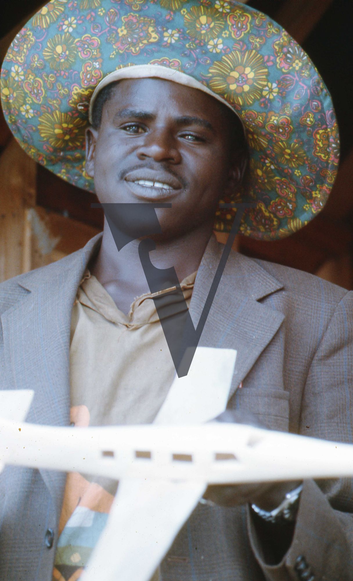 Rhodesia, man in hat with model plane, portrait.
