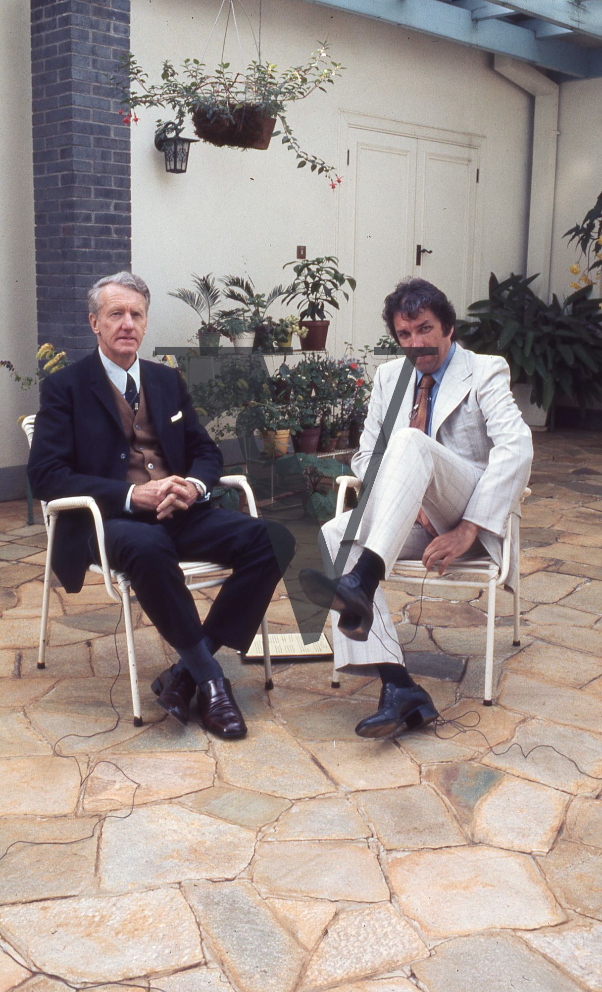Rhodesia, Prime Minister of Rhodesia, Ian Smith interview with Barry Callaghan, seated, exterior, interview, full shot.