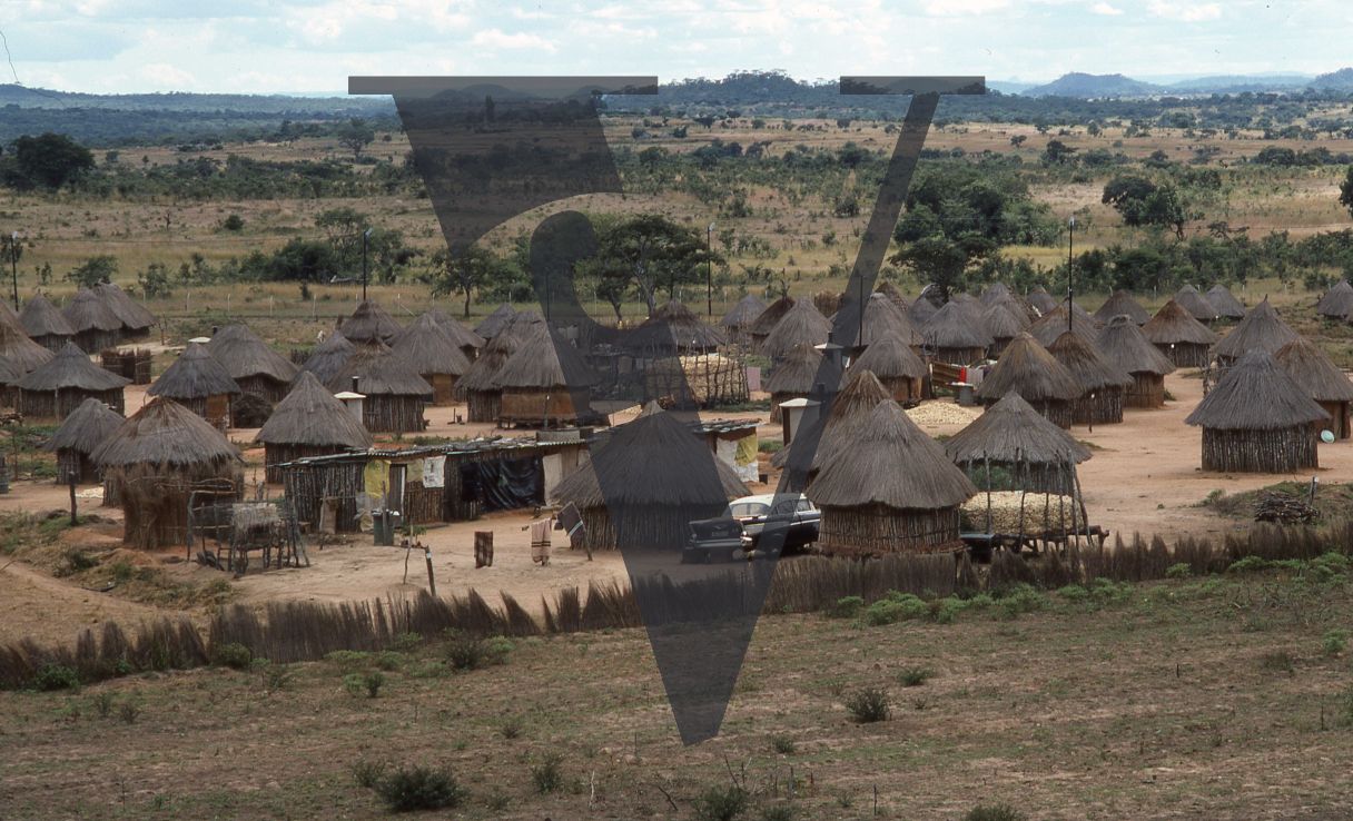 Rhodesia, “protected village”, car, high-angle shot.