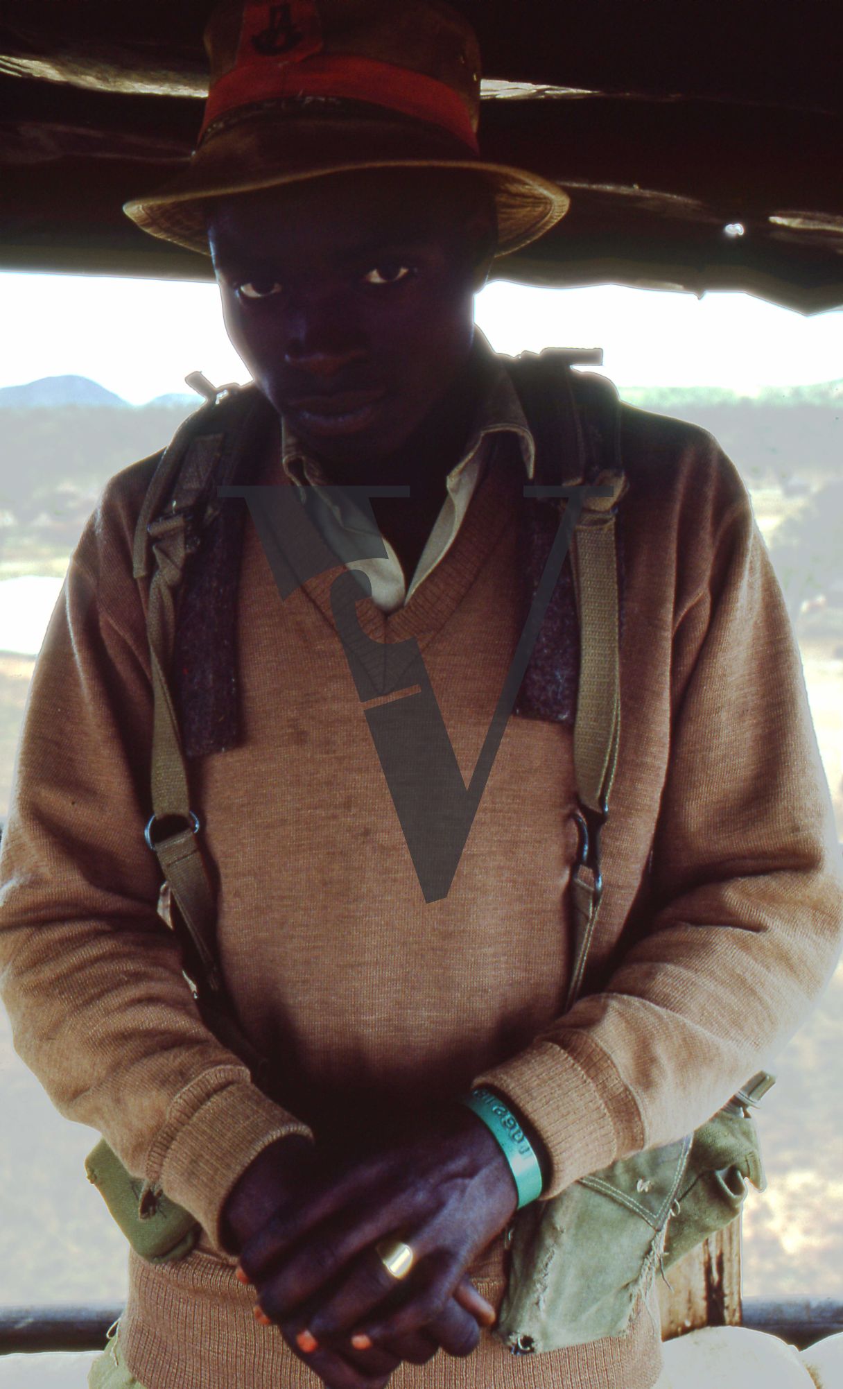 Rhodesia, “protected village”, guard in gun tower, portrait.