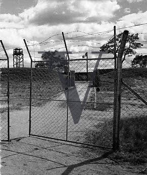 Rhodesia, “protected village”, barbed wire fence, gun tower.