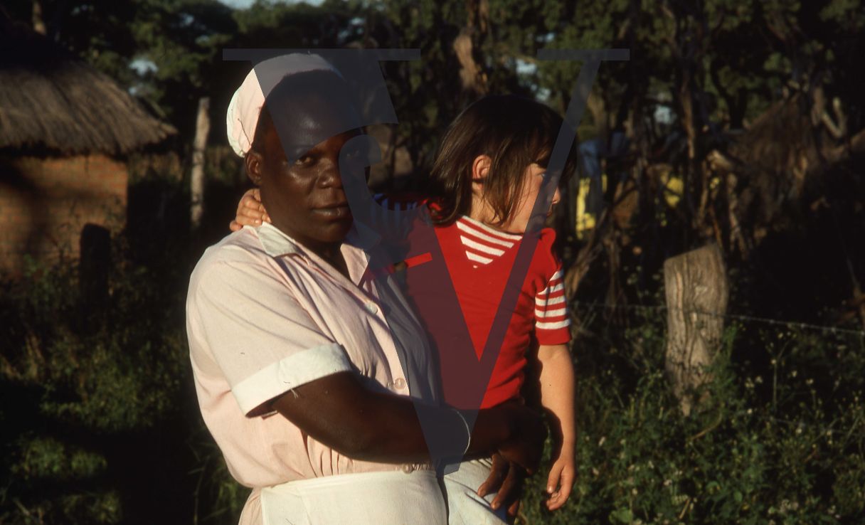 Rhodesia, cattle farm, young girl with nanny, portrait.