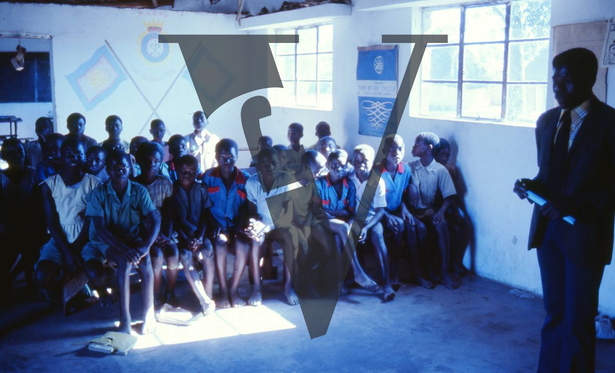 Rhodesia, tobacco farm, schoolroom, teacher, schoolchildren, portrait.