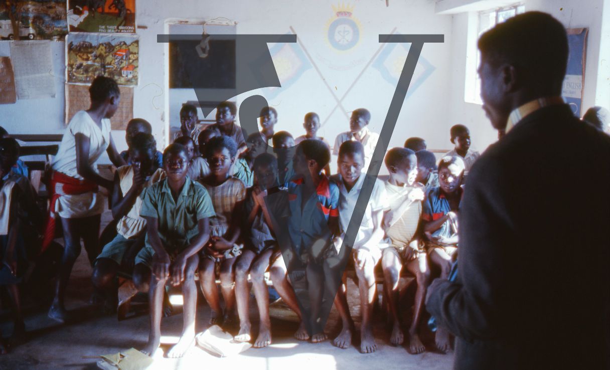 Rhodesia, tobacco farm, schoolroom, teacher, schoolchildren.