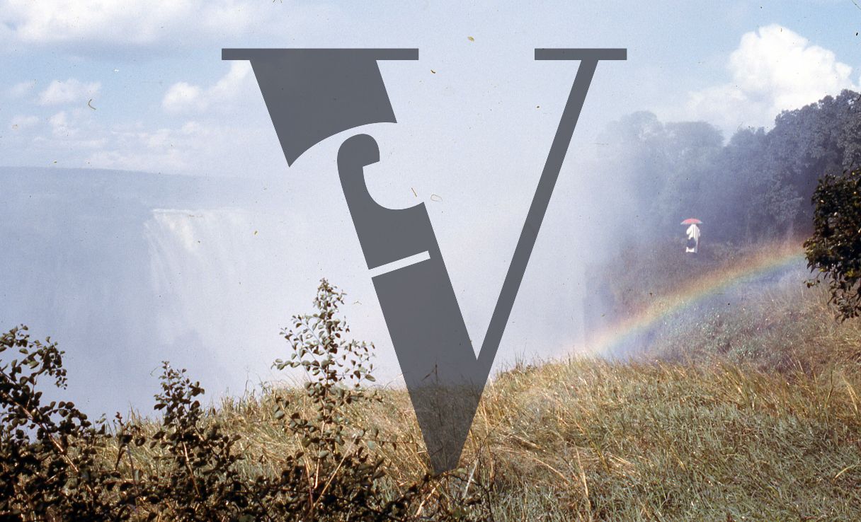 Rhodesia, Victoria Falls, man with umbrella, rainbow, landscape.